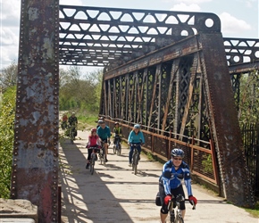 Steve crosses the old railway bridge on the Stratford Cycleway