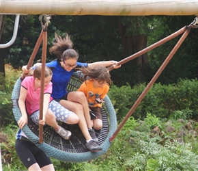 James pushing Lucy, Louise and Francis