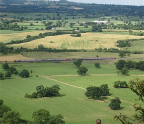 Christopher watches the trains in the valley from Beeston Castle