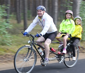 Phil tests his tandem with Alice and Lindsay on board