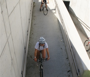 Zoe passes under the railway