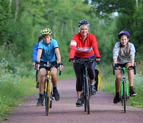 Oscar, Vanessa and Ellie Carter on cycle path to Coutances