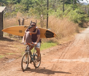 Surfboarding cyclist