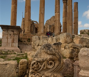 Carved stone lying about as much as it is and rebuilt columns