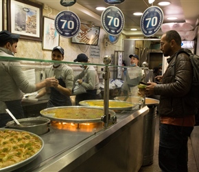 Mahmood purchases 16 desserts for us all. So popular, you pay at a kiosk outside