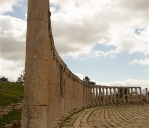 Pillars in the Forum. Fifty-six Ionic columns surround the paved limestone plaza. Discovered by chance when an army camped here in the 18th century and their tent pegs hit the limestone.