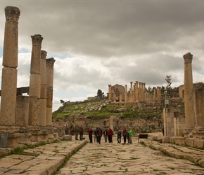 Walking from the Forum along the colonnaded street. The flagstones are original, showing wagon grooves along the way