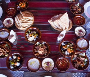 Lots of lovely things for lunch. Sit at a low table, tear a piece of bread and scoop away at the various bowls, no cutlery required