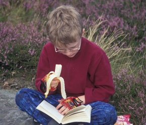 James tucks into lunch at Ros Castle, saving the crisps for later