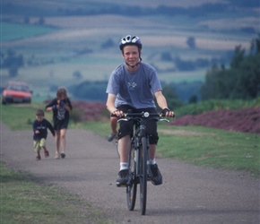 Jonathan climbing to Ros Castle