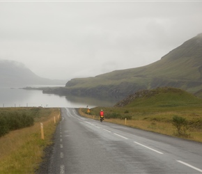 Mike descends to Hvalfjordur. A body of water full of birdlife and beautiful hillside views to the right