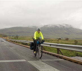 Lorn crosses the bridge from Laxfoss waterfall