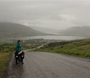 Our first encounter with Icelandic gravel roads. We had climbed to the top of this long valley and Sharon was about to descend into it