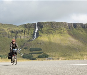 Steve starts the climb towards Snæfellsjökull National Park with Bjarnarfoss behind