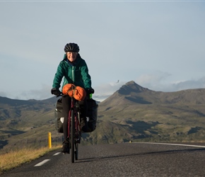 Sharon approaches the top of the climb. The permanant glacier on Snæfellsjökull peaks out behind her