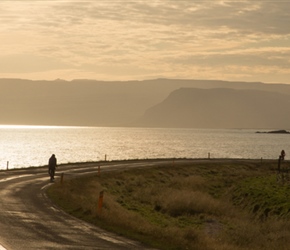 Coastal road with a setting sun