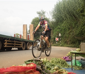 Lorna with her game face on, climbing towards Nuwara Eliya chasing Robin and Martin