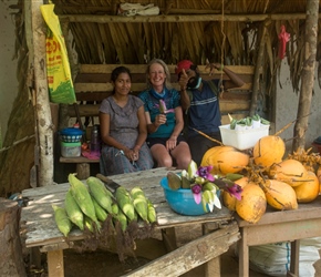 We stopped for some sweetcorn boiled on the fire, this was washed down with a coconut. What we didn't try's the illicit substance wrapped in leaf atop everything else. We were definitely a curiosity to the chap on the right who gave us a purple water