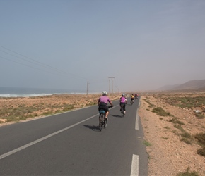 Mel heads along the Atlantic Coast road towards Aglou, pounding surf to our left