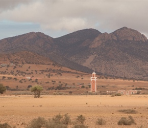 Phil heads for another mosque. There were many of these towers throughout our rides usually painted orange