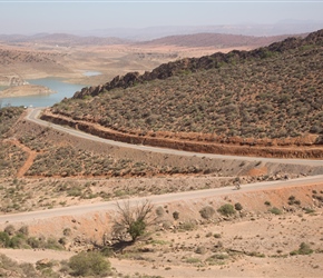 Sarah descends to cross the dam at the Barrage, taken from the viewpoint