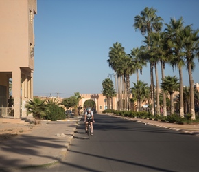 John leaves Tiznit along a palm fringed avenue