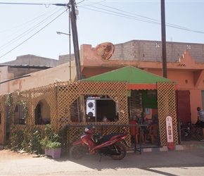 We stopped for morning coffee in Arbaa Rasmouka.Many tea places in Morocco were pretty basic, but this one had a door and TV