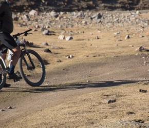 There were ground squirrels in a lot of places, here one peaks out as Peter checks him/her out