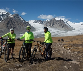 Lorraine, Kath and Shirley in front of Khüiten Peak and glacier