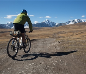 Peter starts the ascent through the National Park towards in front of Khüiten Peak and its glacier