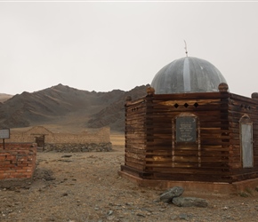 We passed this on the left within a few km of leaving the campsite. This Kazak Mausoleum contained a single body under a mound of stones. I did ask our guide why he didn't stop. @Because we don't like these places' a fair comment