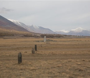 Rocks representing servants extend away from the Turkish statues