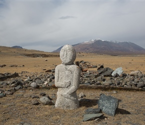 Holding a goblet in his right hand and a sword from the left this 14th Century granite state guards the grave. The heads were knocked of by uyghur invaders who lived here for 100 years