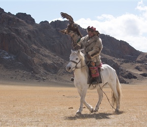 Eagle hunter on horseback