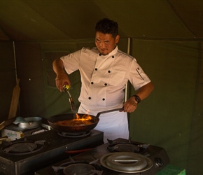 Baghi in his best chef whites, heats our lunchtime pizza with a  blowtorch