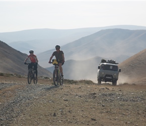 Half way up the first climb, David and Claire approach the farmstead with back up van in attendance