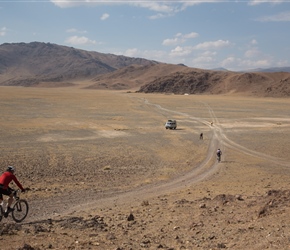 A rocky outcrop leads to the final valley before the finish