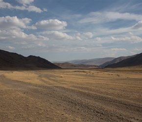 The final valley was wide and flat with an unusual sight, a river running through the middle