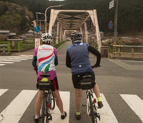 Maragaret and Shirley wait at the lights to cross the Yoshino River