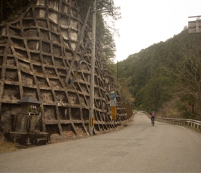 Rob starts the final climb. The concrete infrastructure on even the smallest road was remarkable, in this case to stop landslides