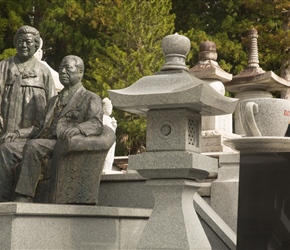 Graves were a little different. Here lay the owner of ICC coffee, wife in attendance and a coffee cup