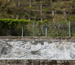 Japan has used a lot of concrete to hold the roads in place. In this case crabs were used to decorate