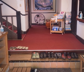 Shoes all lined up and ready to go. You simply don't wear outdoor wear in these places