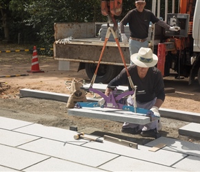 A new central pathway was being laid. The skill in keeping this flat and straight was remarkable