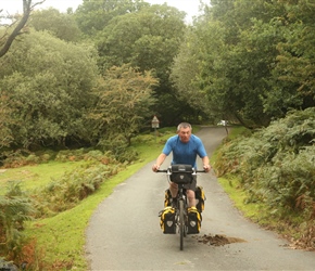 Andy negotiates the horse manure on the cyclepath climbing onto Roborough Down