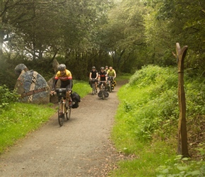 Passing the high point of the Tarka trail marked by a Sustrans marker and a piece of art