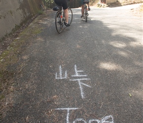 Jo and Christine make it over the first pass. The Japanese charactor on the left looking like a trident means mountain