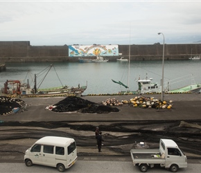 Fishing nets, harbour and mural