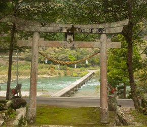 David crosses the submersible bridge opposite Hage Tenmangu Temple