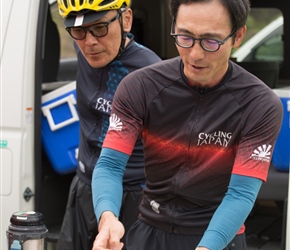 Ken watched by Issy demonstarates the turns on the map at the morning coffee stop.